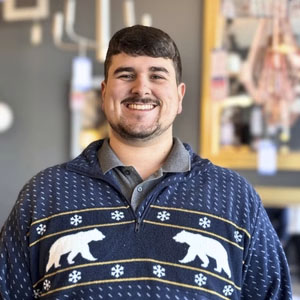 Man with blue sweater